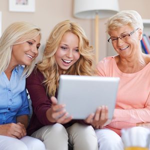 Women using tablet together
