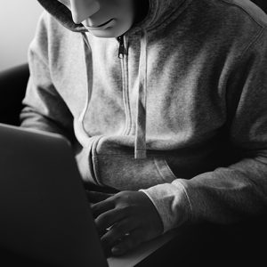 Hacker using a laptop