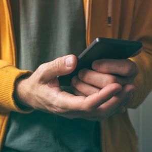 Person using mobile phone