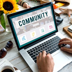 Person using a community page on their laptop